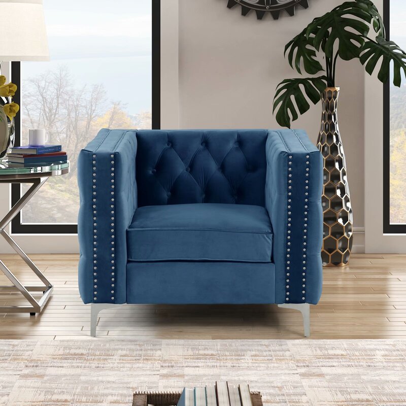 Blue velvet store tufted chair