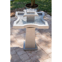Resin Outdoor Floor Fountain Perfectly Centered in the Middle of a Flowerbed Fountain will Bring the Relaxing Sounds of Water
