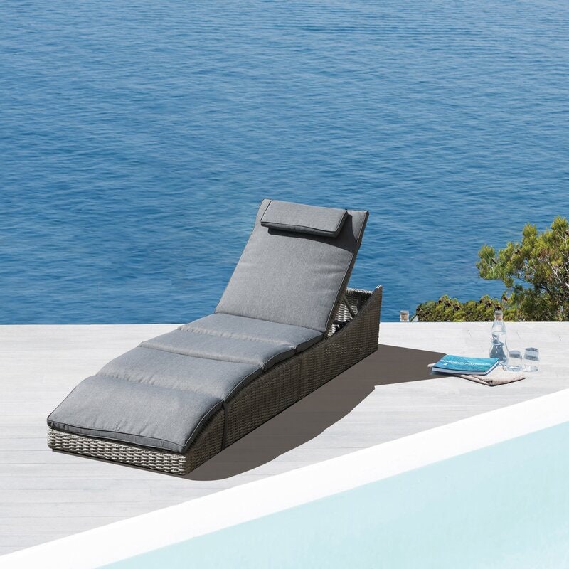Long Reclining Single Chaise with Cushions Perfect for Whiling Away Sunny Days with a Glass of Cocktail or a Good Book