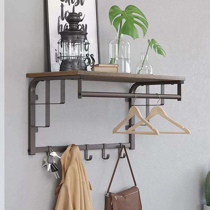 Tovar Wall Mounted Coat Rack Replace your wall art with something both useful and attractive - wall mounted coat rack