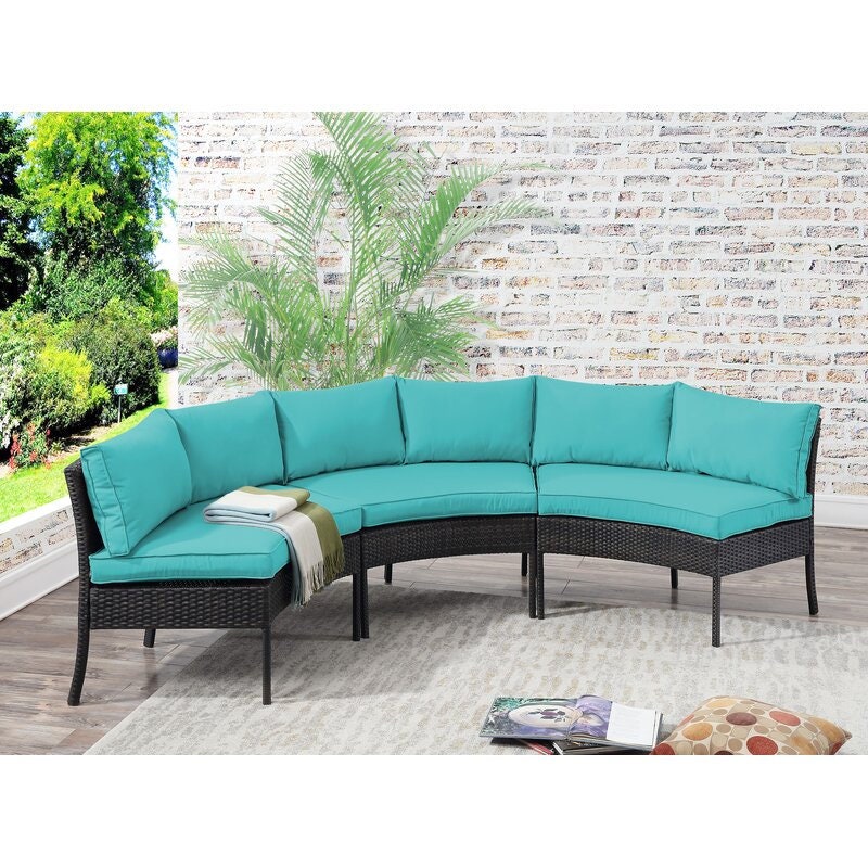 Outdoor Curved Patio Sectional with Cushions Perfect Setting to Host a Party or Lounge with the Family.