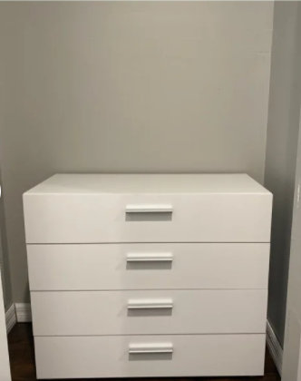 White 4 Drawer 31.57'' W Dresser The Four Drawers Sit on Ball Bearing Glides and Plenty of Spare Storage Space