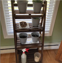 Folding Plant Stand Flexible flip-up tier Panels and the Collapsible Frame is Able to Be Folded This Plant Ladder Shelf Features 4 Tiers