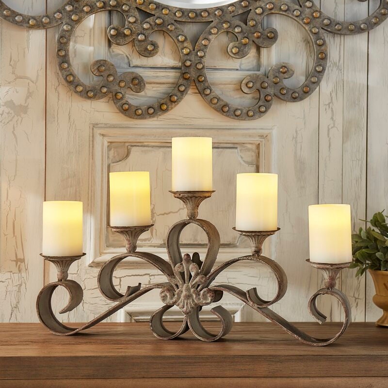 Metal Candelabra This Iron Candle Holder That Takes The Shape of a Candelabra Style Chandelier Can Hold 5 Pillar