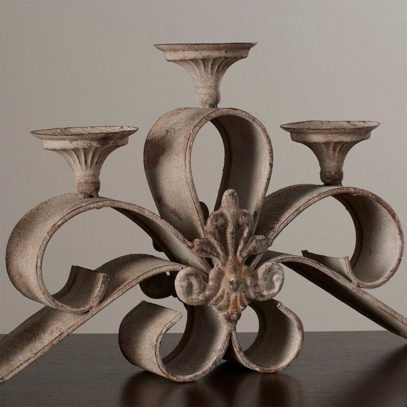 Metal Candelabra This Iron Candle Holder That Takes The Shape of a Candelabra Style Chandelier Can Hold 5 Pillar