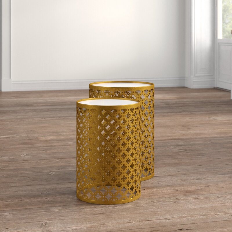 Drum Nesting Tables Set of Two Cylindrical Tables is Crafted From Metal with A Gold Finish for A Pop of Glamour Wherever They Rest