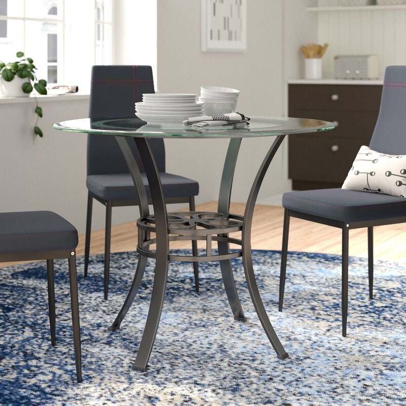 38'' Iron Dining Table Bring Some Streamlined Style to your Dining Space with this small Dining Table  Crafted of Clear Tempered Blass
