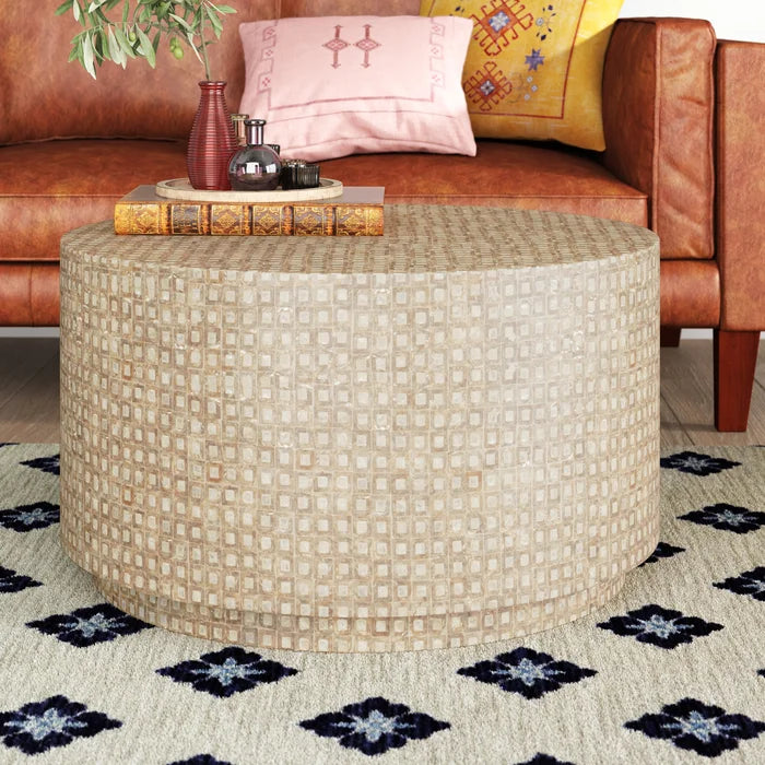 Anika Drum Coffee Table Features a Capiz Shell Finish in a Two Toned Gold
