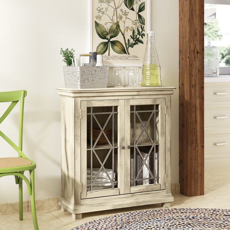 34'' Tall 2 - Door Accent Cabinet Two Doors with Their Glass Panes and Metal Caming in Geometric Patterns