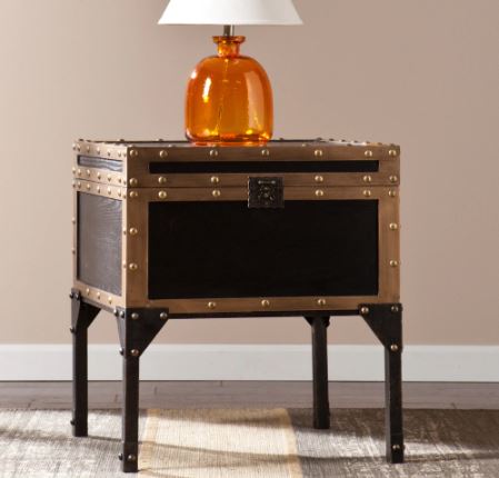 Trunk Side/ End Table Perfect Addition to your Living Room. With An Antique Black Finish Accented with Dark Antique Bronze Detailing