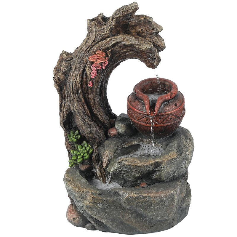 Daulton Resin Tree Stump and Rock Outdoor Fountain
