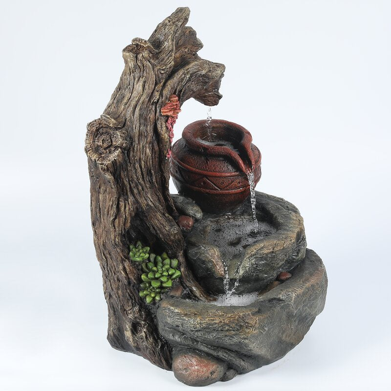 Daulton Resin Tree Stump and Rock Outdoor Fountain