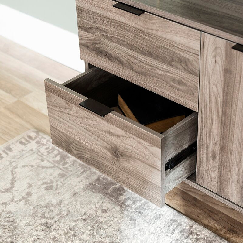 Slate Gray TV Stand for TVs up to 64" Multiple Cubbies on the Right Two Deep Drawers On the Left, and Two Doors that Open up to Additional Shelving
