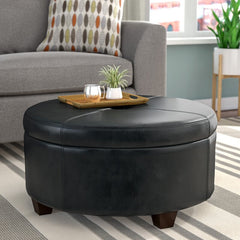 Faulk 31.75'' Wide Faux Leather Tufted Round Storage Ottoman with Storage