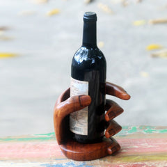 Solid Wood Tabletop Wine Bottle Rack in Brown Embraces A Bottle of Wine
