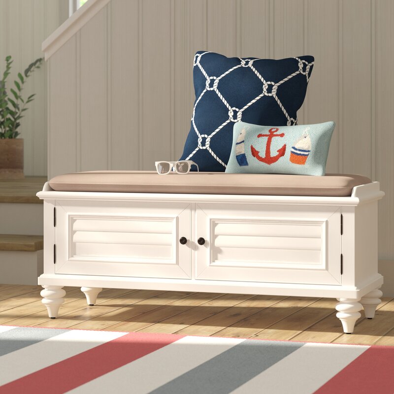 Brushed White Solid Wood Storage Bench Two Louvered Doors with Brass Knobs Open to Reveal a Spot to Stash Spare Blankets, Board Games