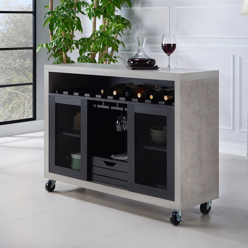 47.25'' Wide 1 Drawer Server Mesh Sliding Cabinet Doors for Plenty Of Factory Flair. Beyond Stylish, This Server Features A 10-Bottle Wine Rack