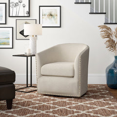 28'' Wide Swivel Barrel Chair This Barrel Armchair Brings An Eye-Catching Spare Seat to your Living Room Wrapped in Polyester Upholstery