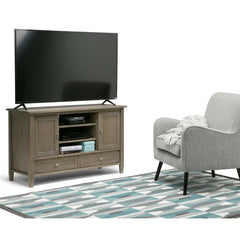 Nortonville Solid Wood TV Stand for TVs up to 50" Adjustable Shelves Provide Storage Space