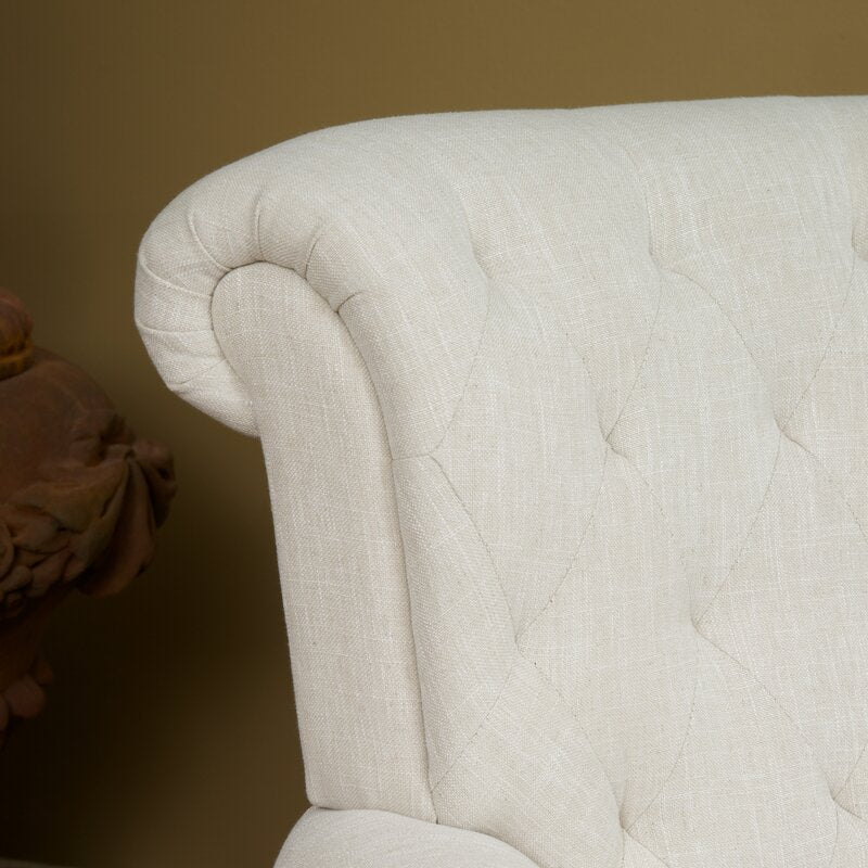 36'' Wide Tufted Armchair Classic and Contemporary Elements Collide in this Armchair. Founded Atop Finished Legs