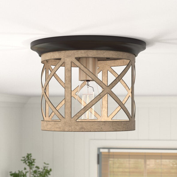 Seles 1 Light 8'' Caged Drum Flush Mount Metal and has an Oil Rubbed Bronze Finished
