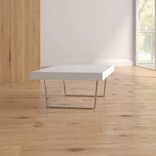 White Sienna Sled Coffee Table Anchors Your Living Room With Modern Style