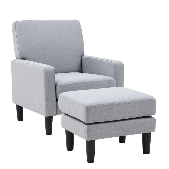 Wide armchair with on sale ottoman